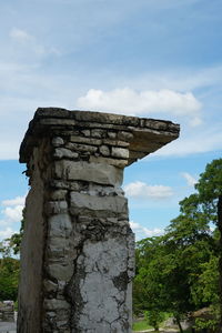 Low angle view of old temple against sky