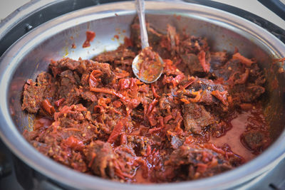 High angle view of meat in container