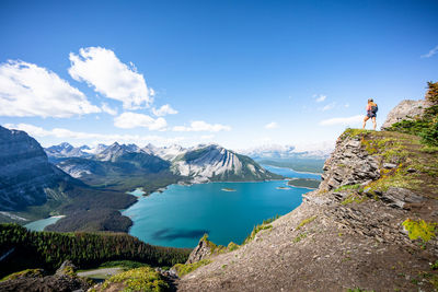 Hiker above upper kananaskis lake in canadian rockies