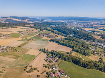 Aerial view of agricultural landscape against sky