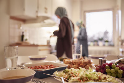 Women preparing eid al-fitr at home