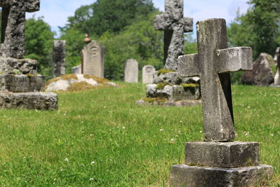 Stone cross in cemetery