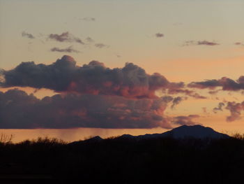 Silhouette of mountain against sky during sunset