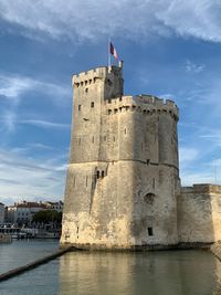 Low angle view of fort against sky