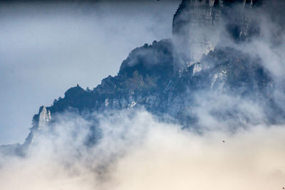 Close-up of smoke against sky