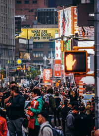 People on city street at night