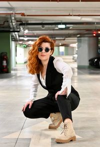 Portrait of young woman in sunglasses