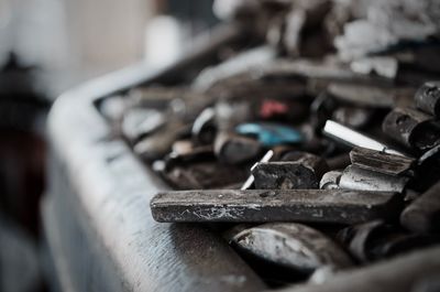 Close-up of chain on table