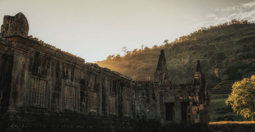 Low angle view of old building against sky