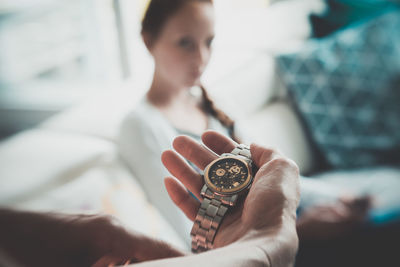 Close-up of woman holding hand