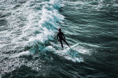 Man surfing in sea