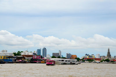 Boats moored on chao phraya river