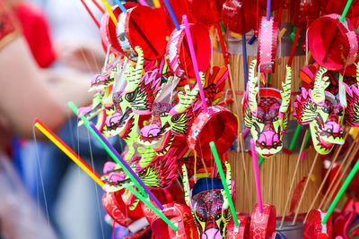 Close-up of toys for sale in market