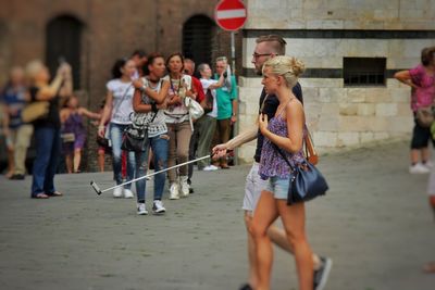 Group of people playing outdoors