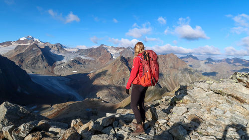 Portrait of woman standing on mountain