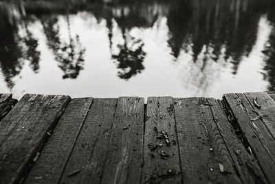 Close-up of wooden pier over lake
