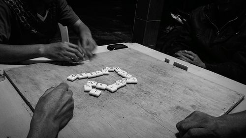 High angle view of man playing games at table