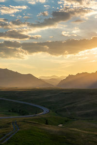 Scenic view of landscape against sky during sunset