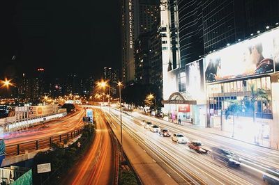 Light trails on city street at night