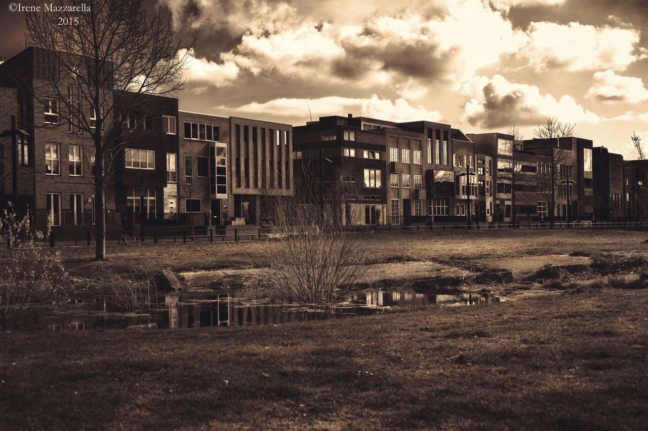 building exterior, architecture, built structure, sky, cloud - sky, residential structure, house, building, residential building, city, grass, tree, cloud, window, cloudy, outdoors, day, no people, abandoned, sunlight