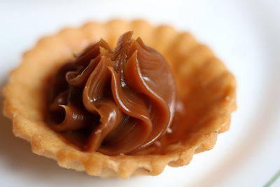 Close-up of caramel cupcake served in plate