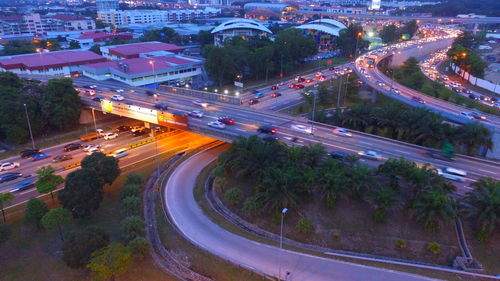 High angle view of light trails on road