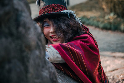 Portrait of girl looking away outdoors