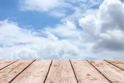 Scenic view of pier against blue sky