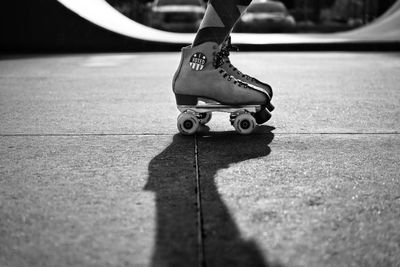 Low section of person skateboarding on skateboard