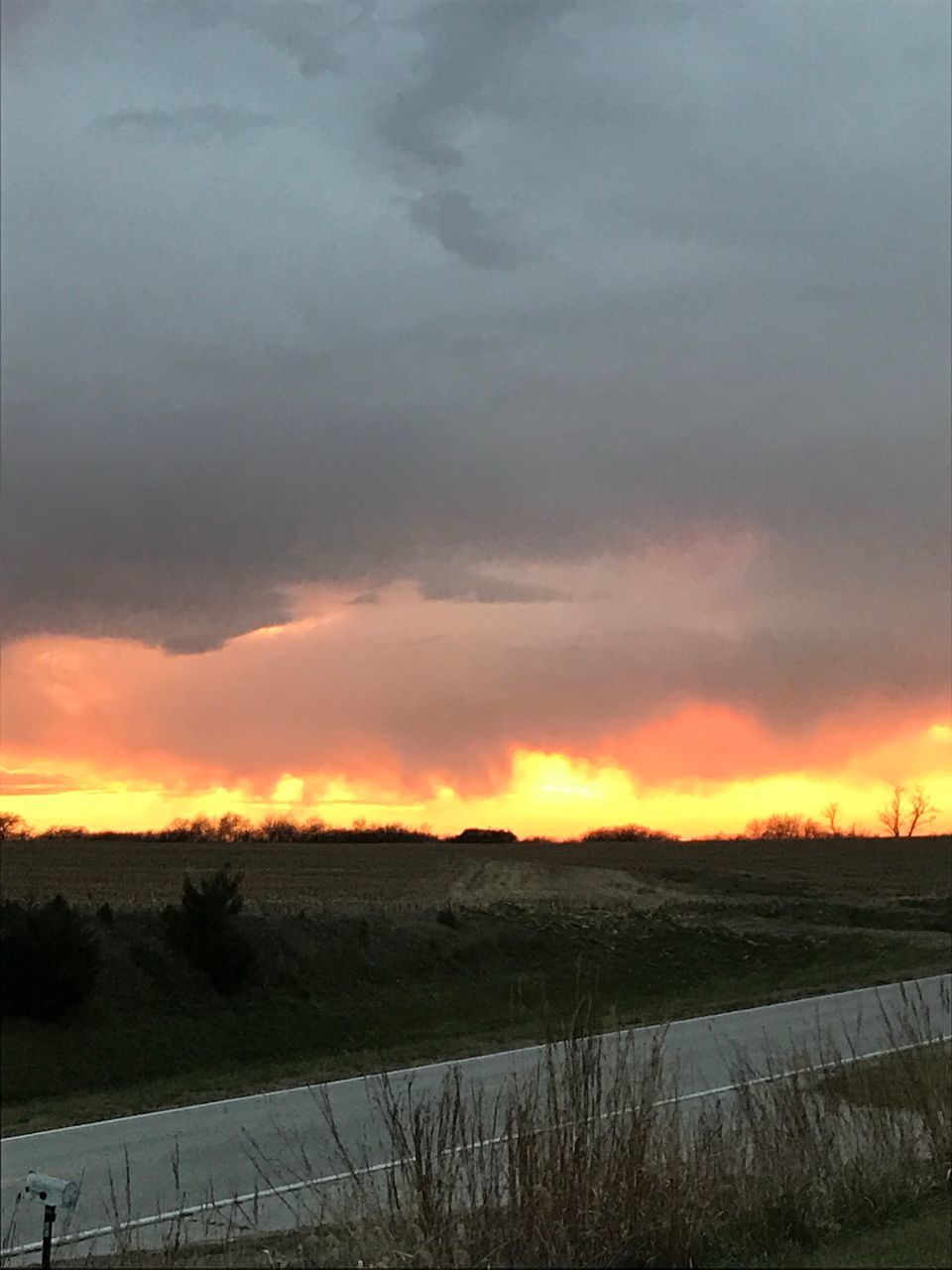 SCENIC VIEW OF DRAMATIC SKY DURING SUNSET