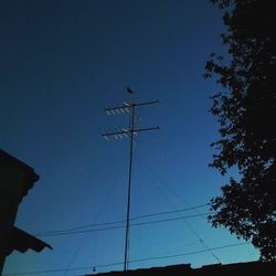 Low angle view of power lines