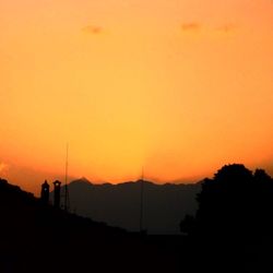 Scenic view of landscape against sky during sunset