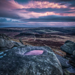 Aerial view of landscape against sky during sunset