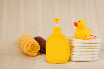 Close-up of yellow toys on table