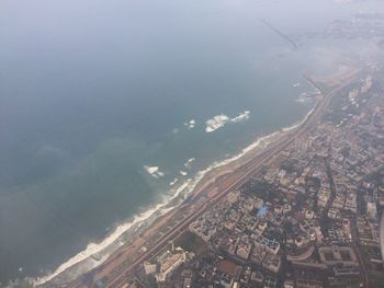 Aerial view of cityscape and sea