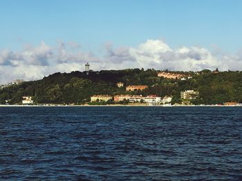 Scenic view of sea against cloudy sky