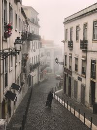 Street amidst buildings in city