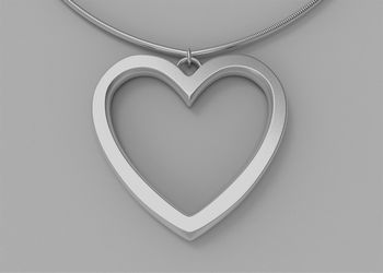 Directly above shot of heart shape on white background