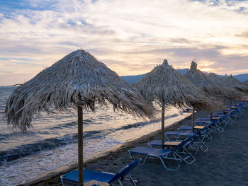 Panoramic view of beach against sky during sunset