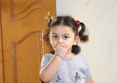 Portrait of cute girl at home