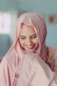 Close-up of a smiling young woman