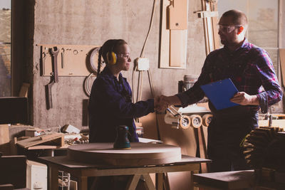 Friends working on table