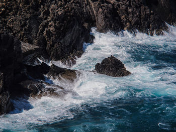 Water splashing on rocks