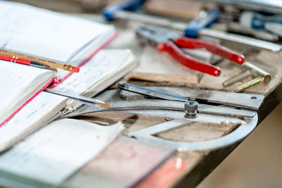 High angle view of work tools on table