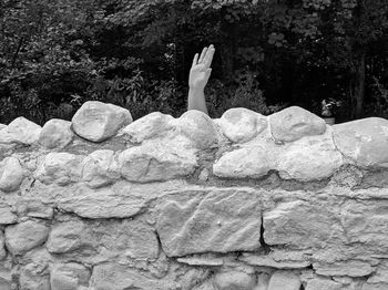 Low section of woman on rock