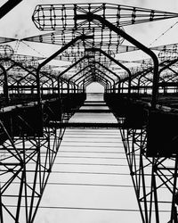 Low angle view of metal structure against sky