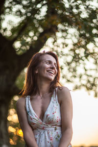 Smiling woman looking away