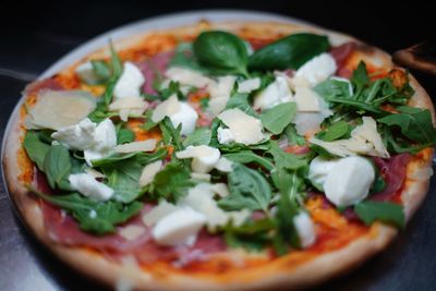 Close-up of pizza served in plate