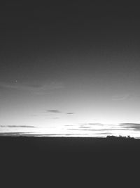 Scenic view of silhouette landscape against sky during sunset