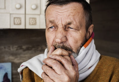 Close-up portrait of elderly man 